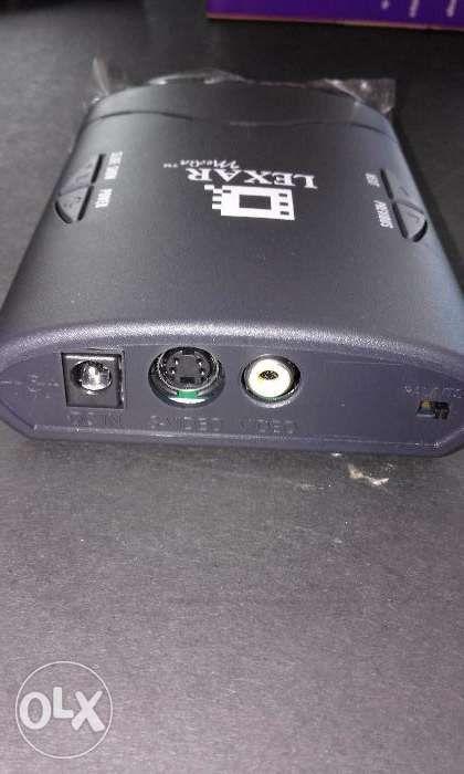 LEXAR TV Digital Photo Player (Category: Video Cameras) located in Quezon City. Submitted by nicegifts (Listing ID 239180817, Image 3). Description: LEXAR TV Digital Photo Player FEATURES: -Share your digital camera pictures with family and friends on your tv set -As easy as using your tv -No computer or camera needed -User manual, power adaptor, remote control Pick up at Gilmore, QC only..