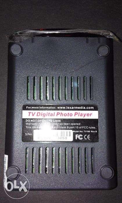 LEXAR TV Digital Photo Player (Category: Video Cameras) located in Quezon City. Submitted by nicegifts (Listing ID 239180817, Image 2). Description: LEXAR TV Digital Photo Player FEATURES: -Share your digital camera pictures with family and friends on your tv set -As easy as using your tv -No computer or camera needed -User manual, power adaptor, remote control Pick up at Gilmore, QC only..
