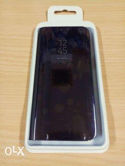 Clear View Standing Cover for S8 (Category: Cases & Sleeves) located in Pasay City. Submitted by jen.pen (Listing ID 239213205, Image 3). Description: Clear View Standing Cover for S8 GH68-47370A Black mirror Clear View Cover for Samsung S8 - Leather back case - Protects from bumps and scratches. - Customize your device. - Durable fabric. - Pleasant to the touch. - Easy to use, with precise access to connectors and volume buttons. - Lasting, does