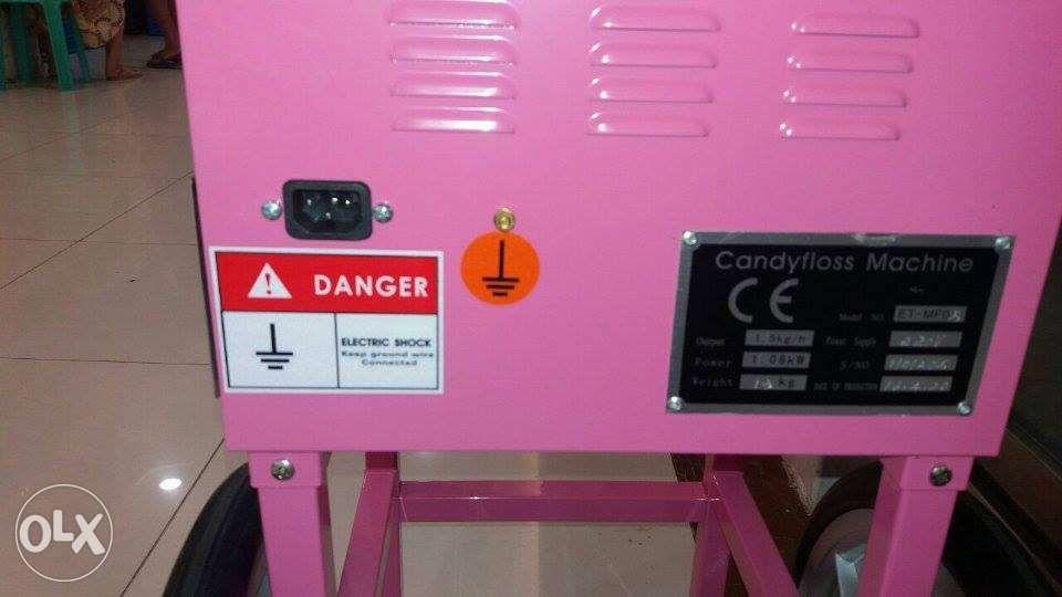 Cotton Candy Machine With Cart (Category: Coffee Machines & Makers) located in Manila. Submitted by joeyroque09 (Listing ID 239253498, Image 3). Description: Cotton Candy Machine ET-MF05 Power: 1030W Volts: 220V / 50Hz Dimension: 58x53x53 cm Weight: 23 Kg. For order/inquiry please contact the number we provided.