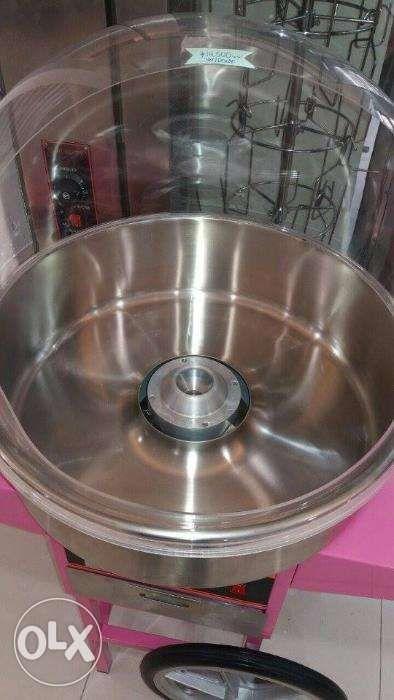 Cotton Candy Machine With Cart (Category: Coffee Machines & Makers) located in Manila. Submitted by joeyroque09 (Listing ID 239253498, Image 2). Description: Cotton Candy Machine ET-MF05 Power: 1030W Volts: 220V / 50Hz Dimension: 58x53x53 cm Weight: 23 Kg. For order/inquiry please contact the number we provided.