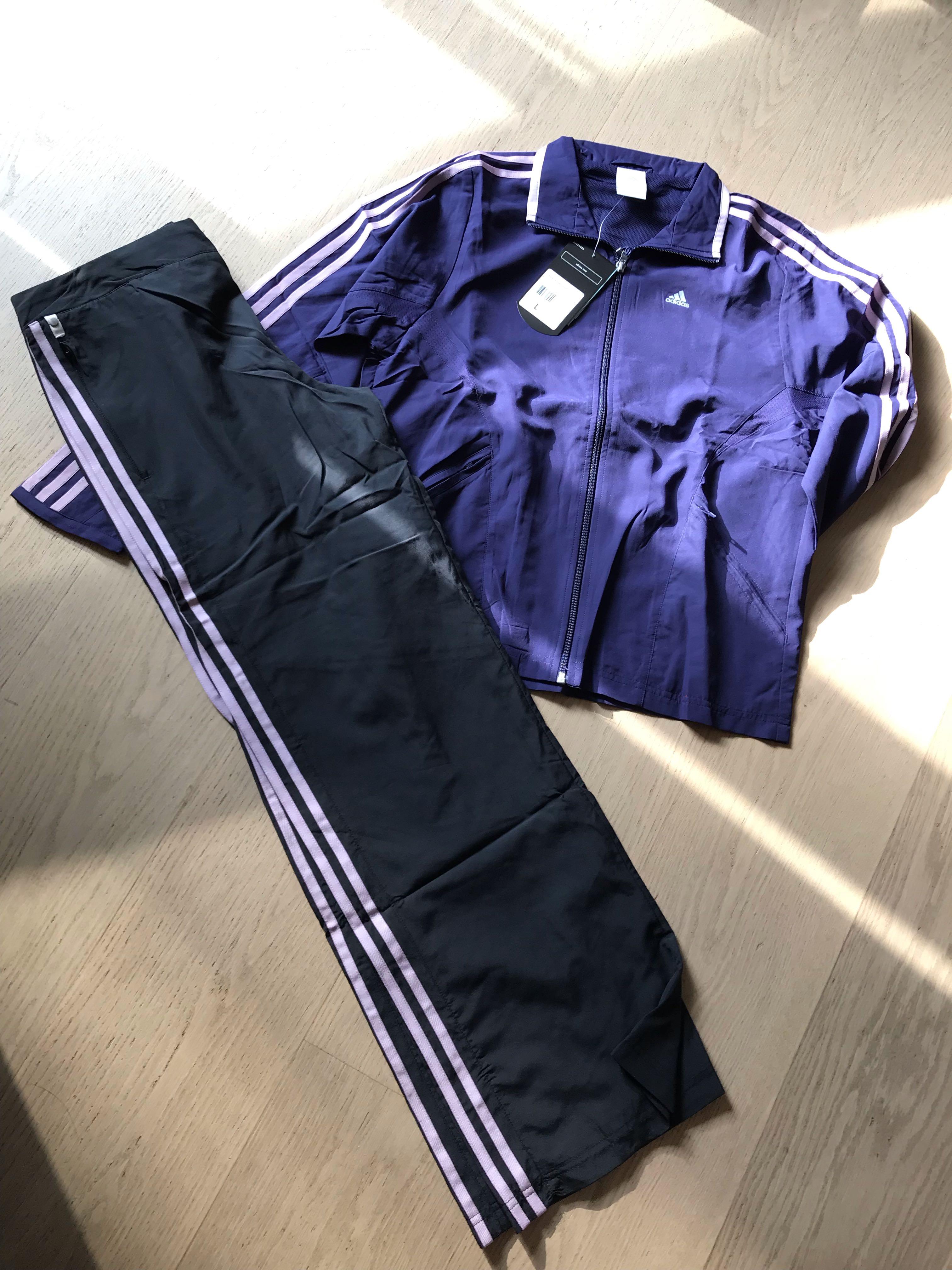 purple and black adidas tracksuits