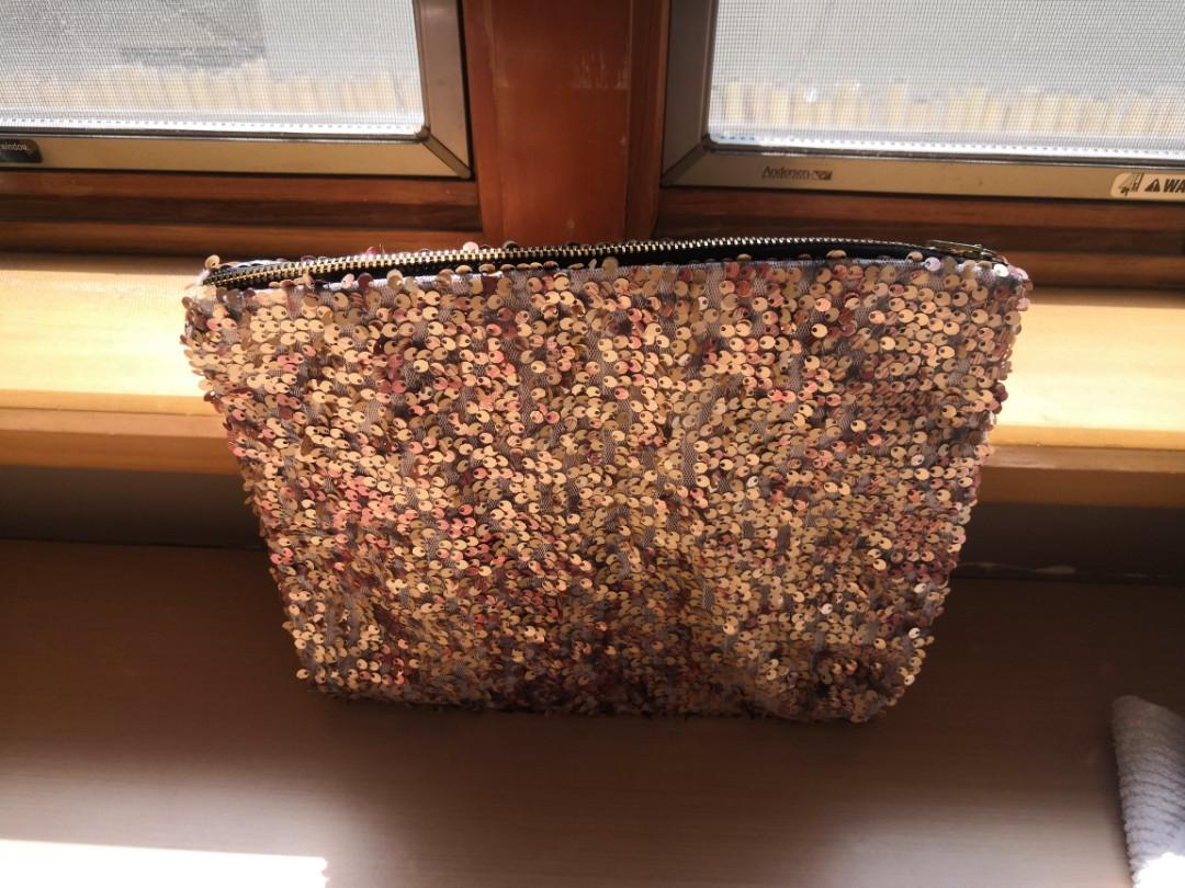 Sequin Pouch (Category: Purses & Pouches) located in San Juan City. Submitted by tinch721 (Listing ID 239113637, Image 1). Description: Brand New without Tag Soft type pouch 11 inches- W 9inches-H Perfect condition. No flaws..