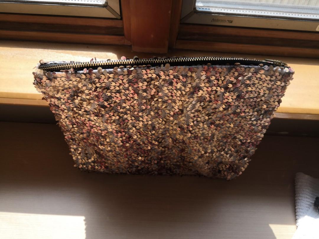 Sequin Pouch (Category: Purses & Pouches) located in San Juan City. Submitted by tinch721 (Listing ID 239113637, Image 3). Description: Brand New without Tag Soft type pouch 11 inches- W 9inches-H Perfect condition. No flaws..