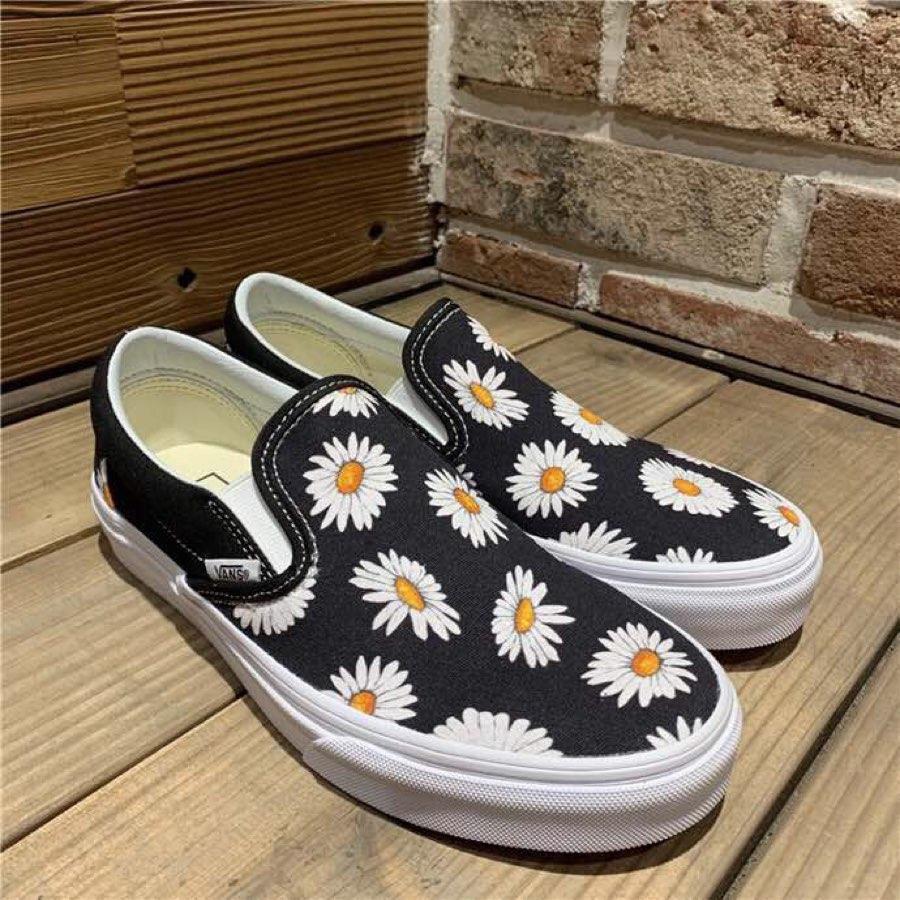 checkered vans with daisies