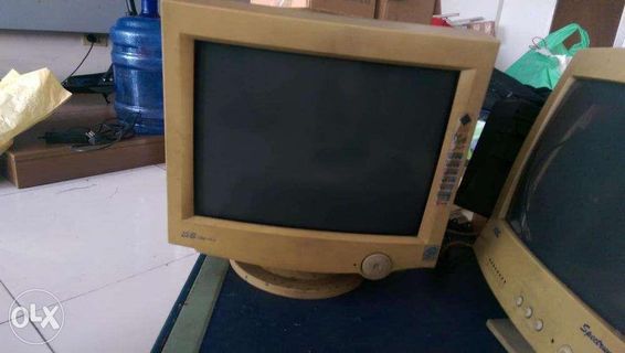 crt monitors and one flat lcd