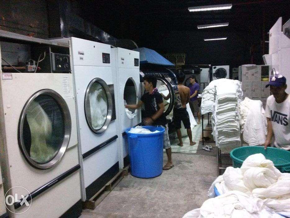 Operational industrial laundry, flatworks, dryers, washcator (Category: Industrial Equipment) located in Quezon City. Submitted by fh7176 (Listing ID 239309644, Image 3). Description: Rush sale Complete Industrial laundry machines, 6 footer Girbau gas type flatworks, 4 units industrial Dryers, Unimac, 3 units washer-extractor. All machines can and have handled industrial known hotel laundry, linens, uniforms and guest laundry. still installed and