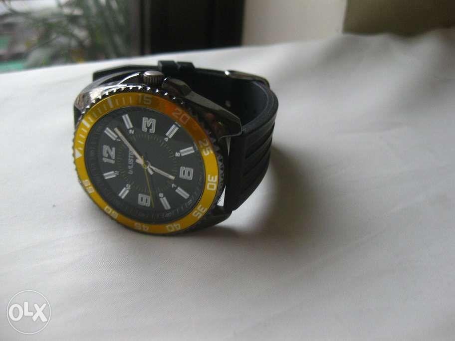 unlisted gold watch