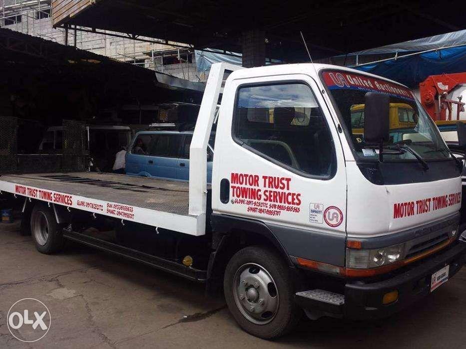 Towing Services Car carrier Wrecker and Boom truck in quezon city, Home Services, Movers