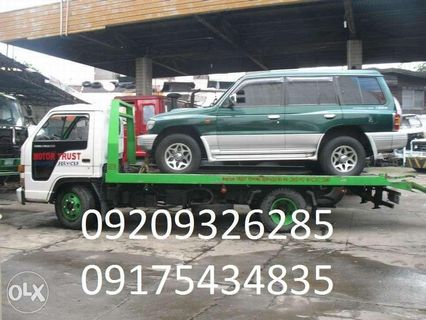 Towing Services Car carrier Wrecker and Boom truck in quezon city