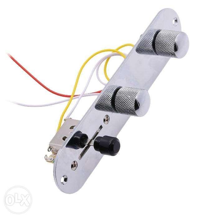 ASCENDAS Silver Wired Loaded Control Plate Harness 3 Way Switch (Category: Musical Instruments) located in Pasig City. Submitted by sterling_galleon (Listing ID 239325324, Image 2). Description: Include 3 way switch, chrome speed knobs, volume and tone controls. Perfect replacemen designed for Fender TL Tele Telecaster style electic guitar. Prewired control plate,easy to use. Shiny appearance. We are the manufacturer direct, that you can buy high