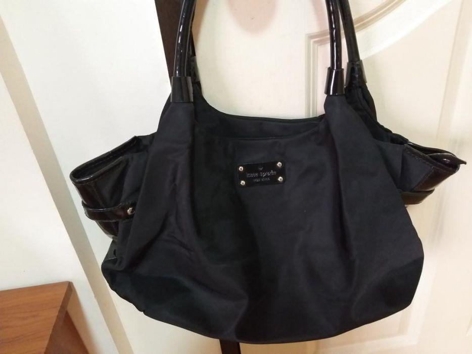 Kate spade black handbag (Category: Tote Bags) located in Manila. Submitted by mallows__ (Listing ID 239351118, Image 2). Description: Kate spade handbag yung handle lng po ang may damage as seen on pictures..