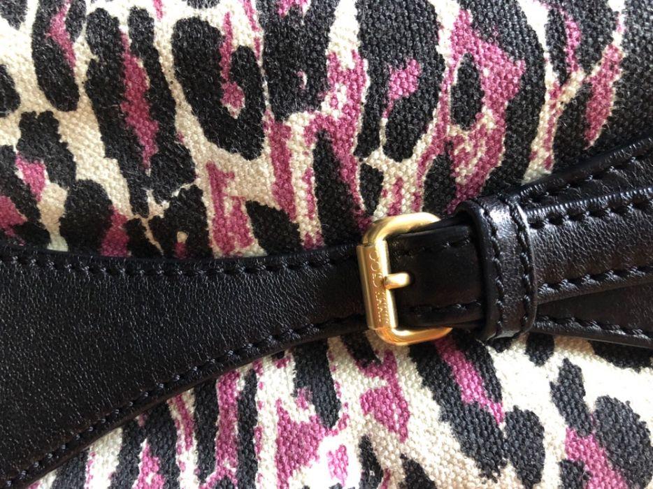 jimmy choo leopard tote (Category: Tote Bags) located in Manila. Submitted by mybaghabit14 (Listing ID 239351140, Image 2). Description: This listing is hosted on Carousell on behalf of OLX Philippines. Preowned but in very good condition. Barely used Comes with dustbag Purchased from greenbelt 4. No smell- Rfs: need smaller bags.