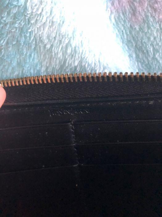 YSL wallet (Category: Luxury Bags & Wallets) located in Manila. Submitted by mybaghabit14 (Listing ID 239351142, Image 2). Description: Ysl belle de jour wallet Preowned but very good condition. A little tanish on zipper and some scratches on the back- Puchased from japan Comes with care Rfs: decluttering.