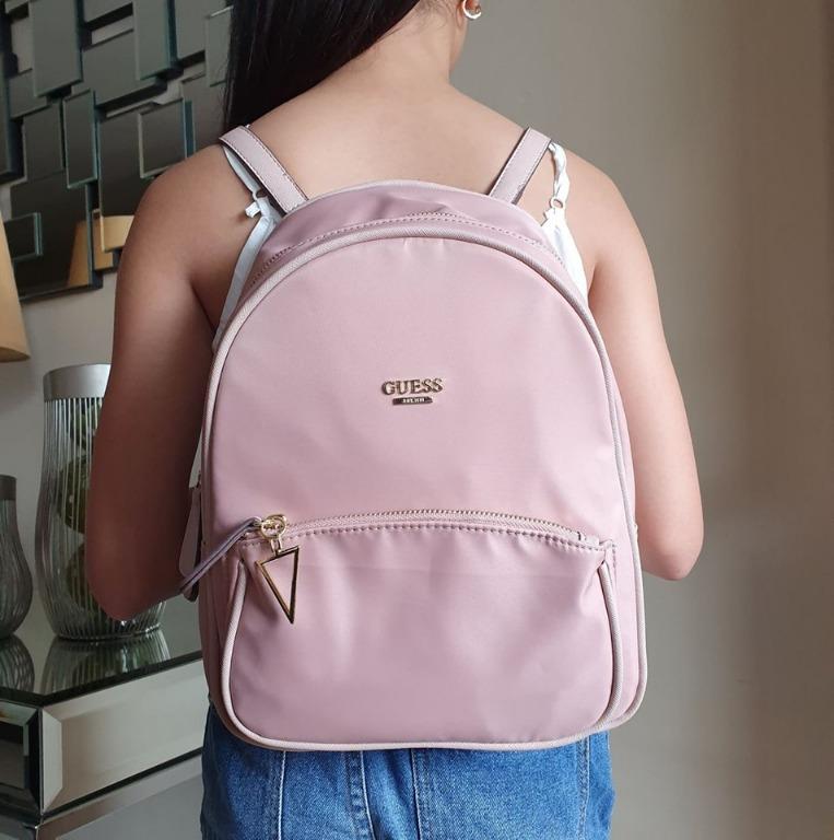 light pink guess backpack