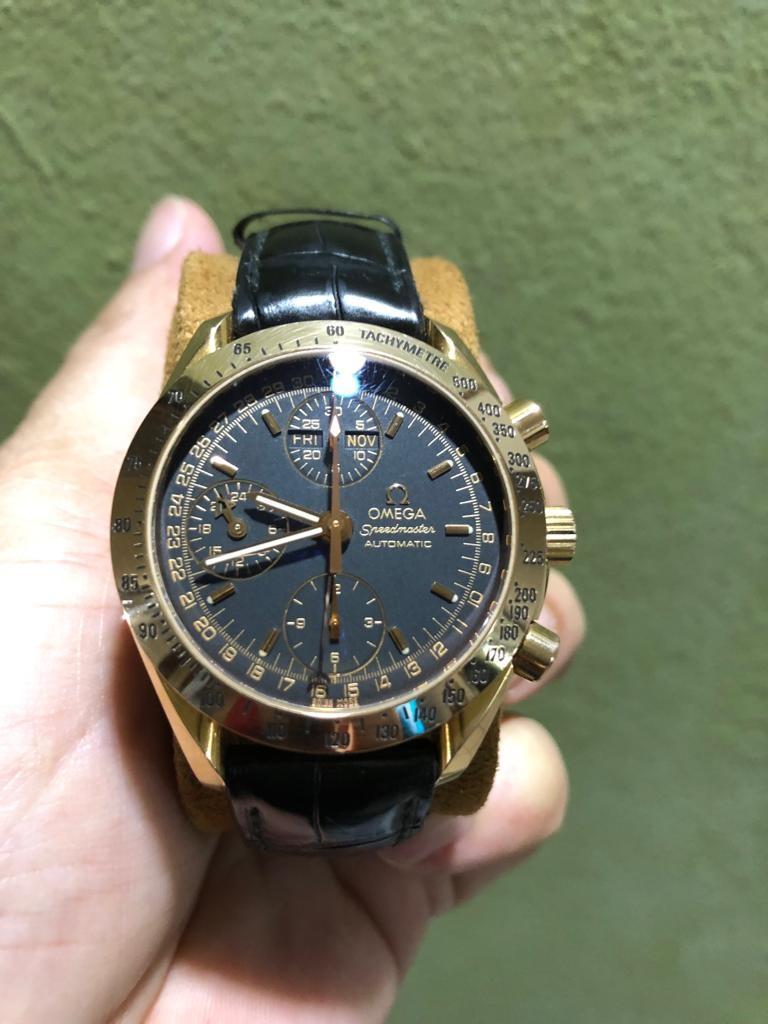 Omega speedmaster triple date gold top