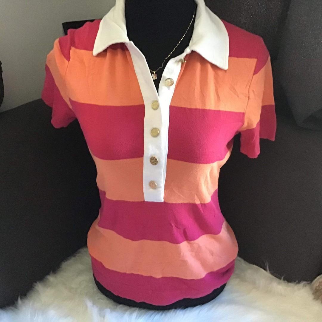 Tory burch polo shirt (Category: Luxury Apparel) located in Cainta. Submitted by temang.ukay (Listing ID 239682084, Image 2). Description: Authentic Tory Burch medium no flaws.