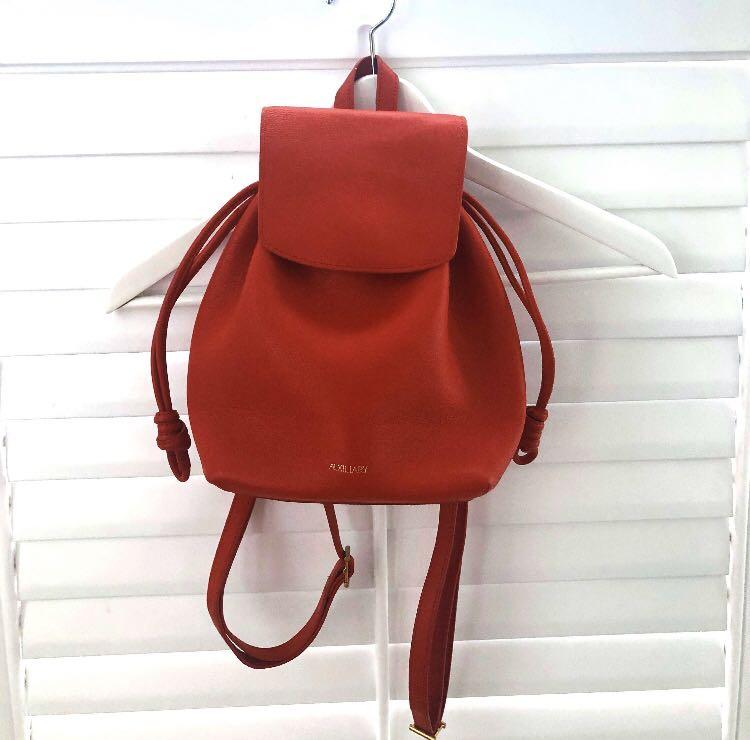 Auxiliary aritzia red leather mini backpack Women s Fashion Accessories on Carousell