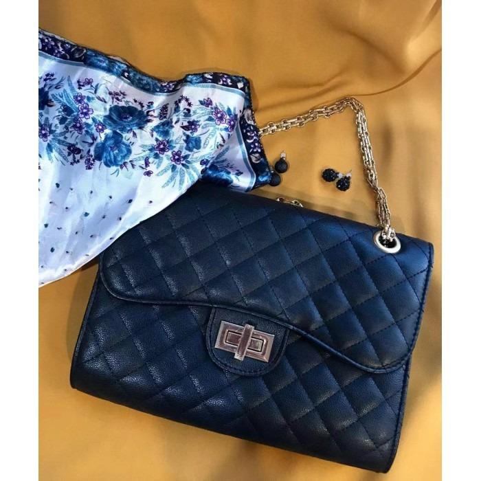 black quilted purse with gold chain strap