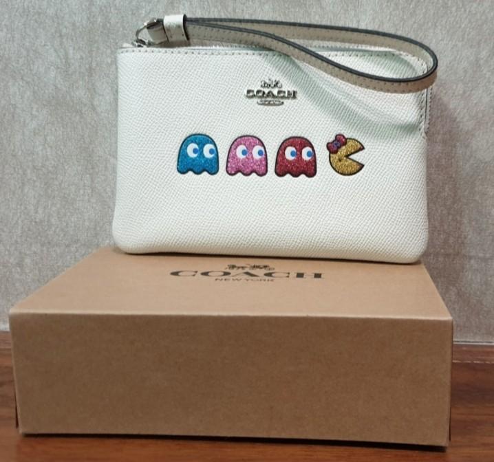 Coach pac best sale man wristlet