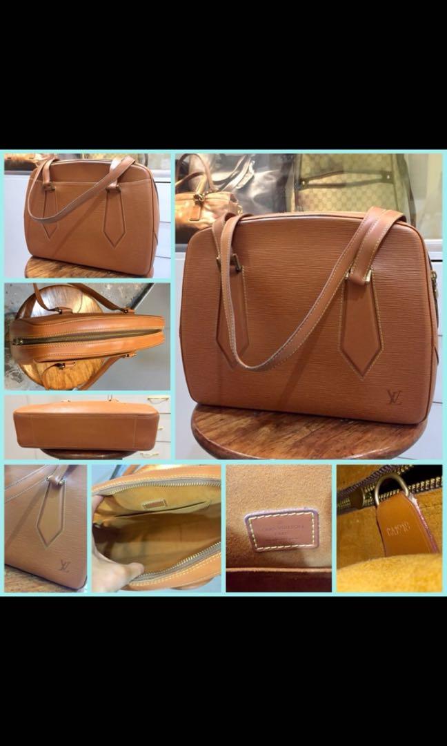Louis Vuitton Epi Voltaire Cipango Gold, Luxury, Bags & Wallets on Carousell