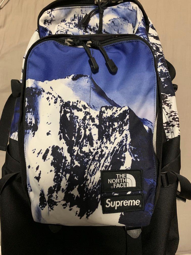 white and blue north face backpack