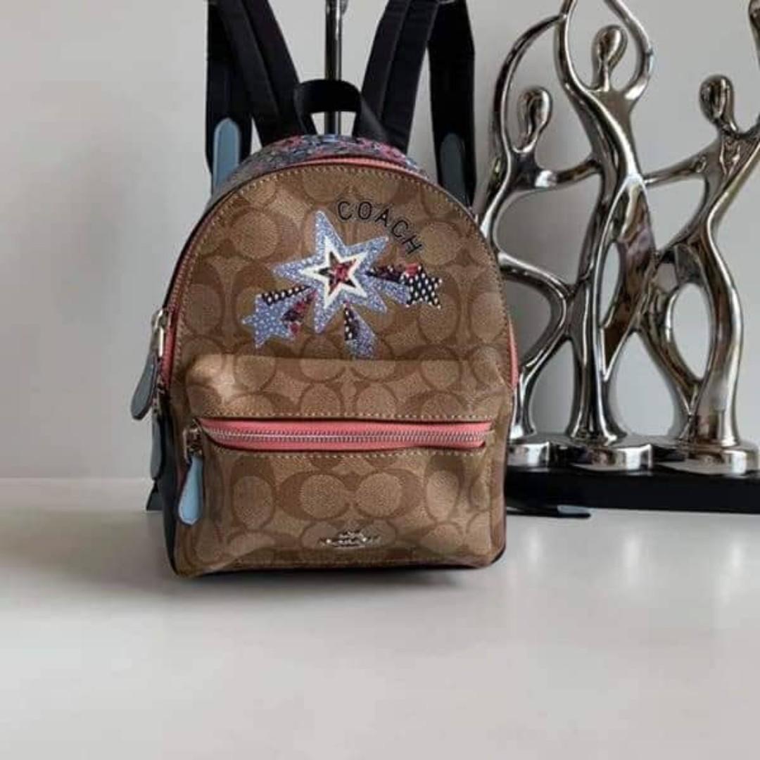 Authentic Coach Signature Star Motif Print Mini Charlie Backpack F45312 Blue Khaki Women s Fashion Bags Wallets Backpacks on Carousell