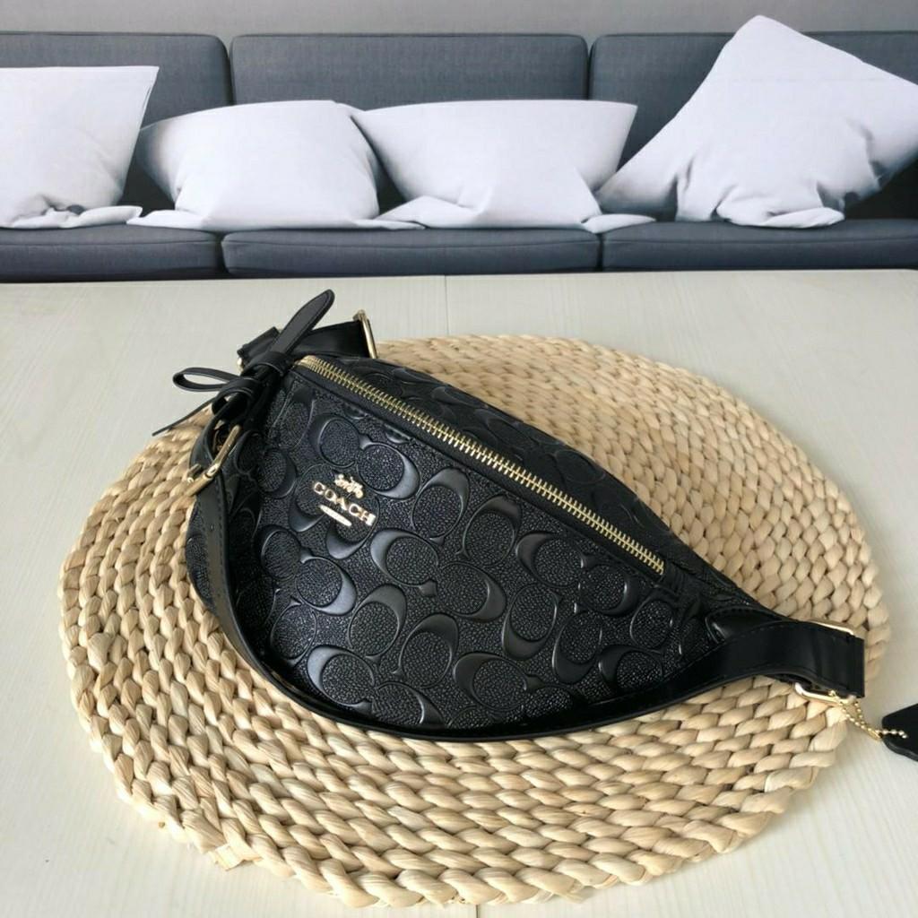Coach belt bag best sale in signature leather