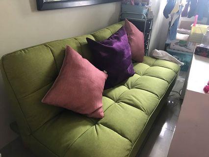 Green collapsible couch