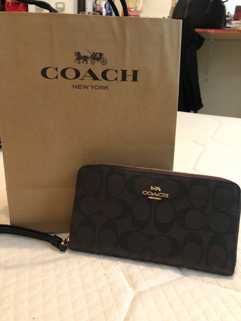 coach wallet in signature canvas