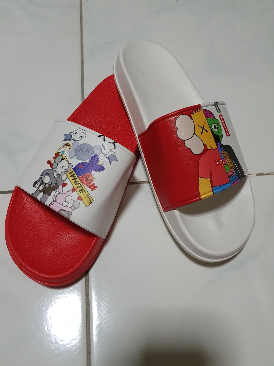 Kaws flip flops online