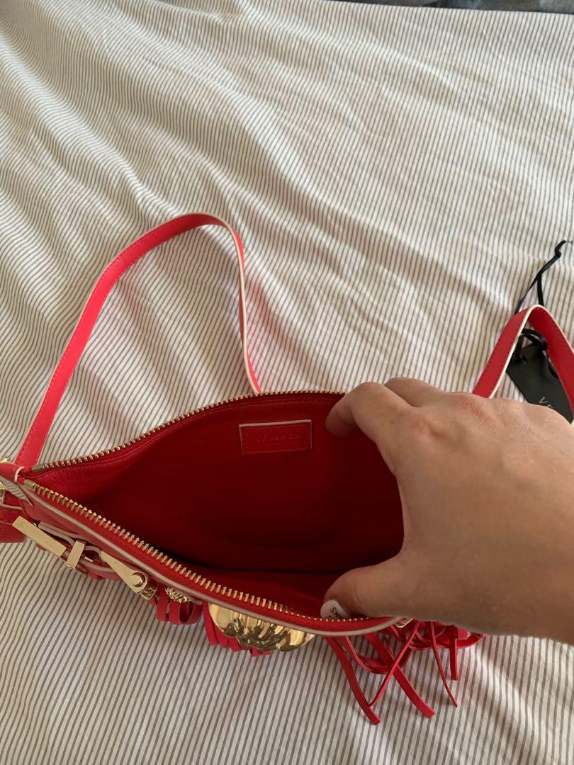 Versace - Authentic (Category: Purses & Pouches) located in Singapore. Submitted by peanutmango (Listing ID 240167010, Image 2). Description: Hot pink for summertime! Beautiful and mint condition Clearing wardrobe space, need a new owner ;) Genuine offer please, thank you !!.