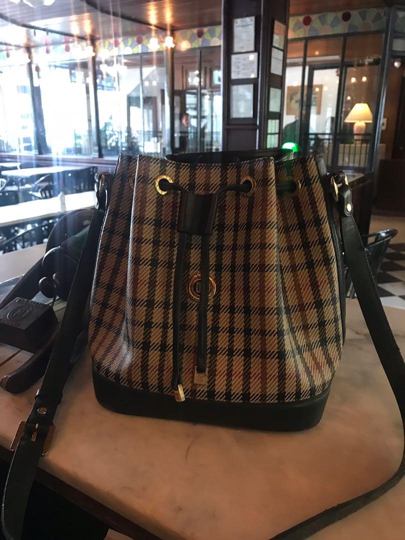 Daks bucket bag price deals