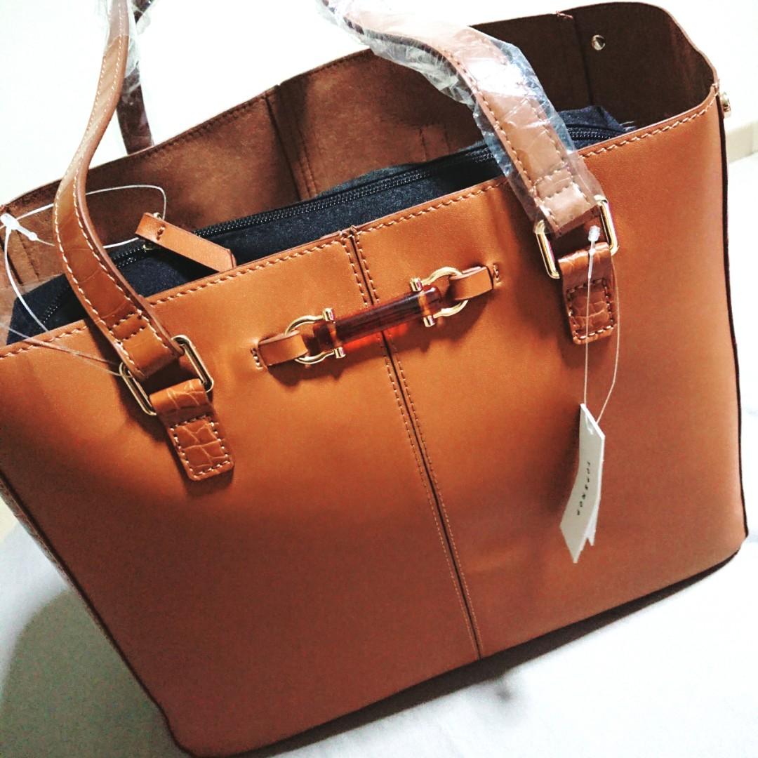 tan color handbag