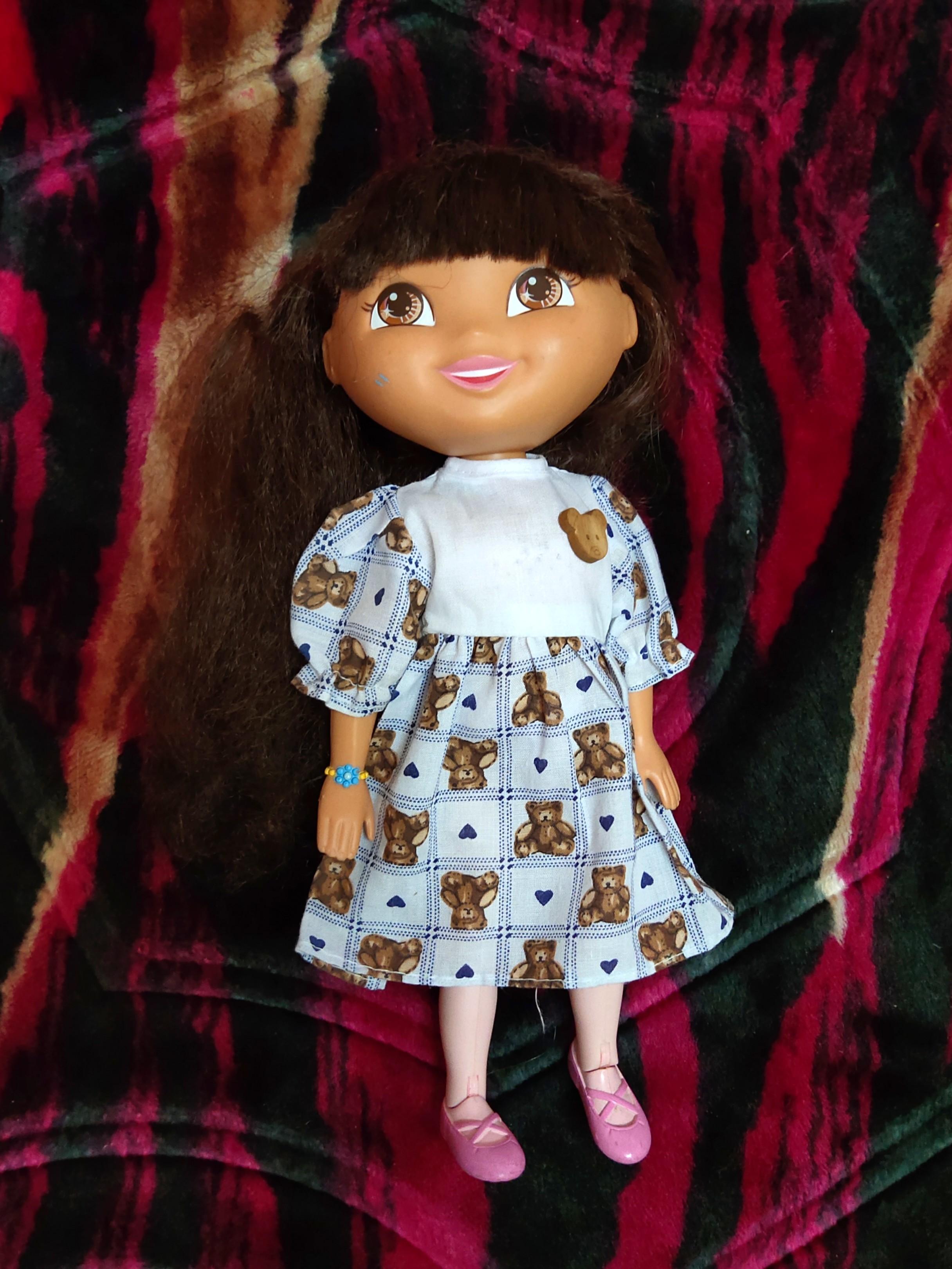 Talking dora on sale doll
