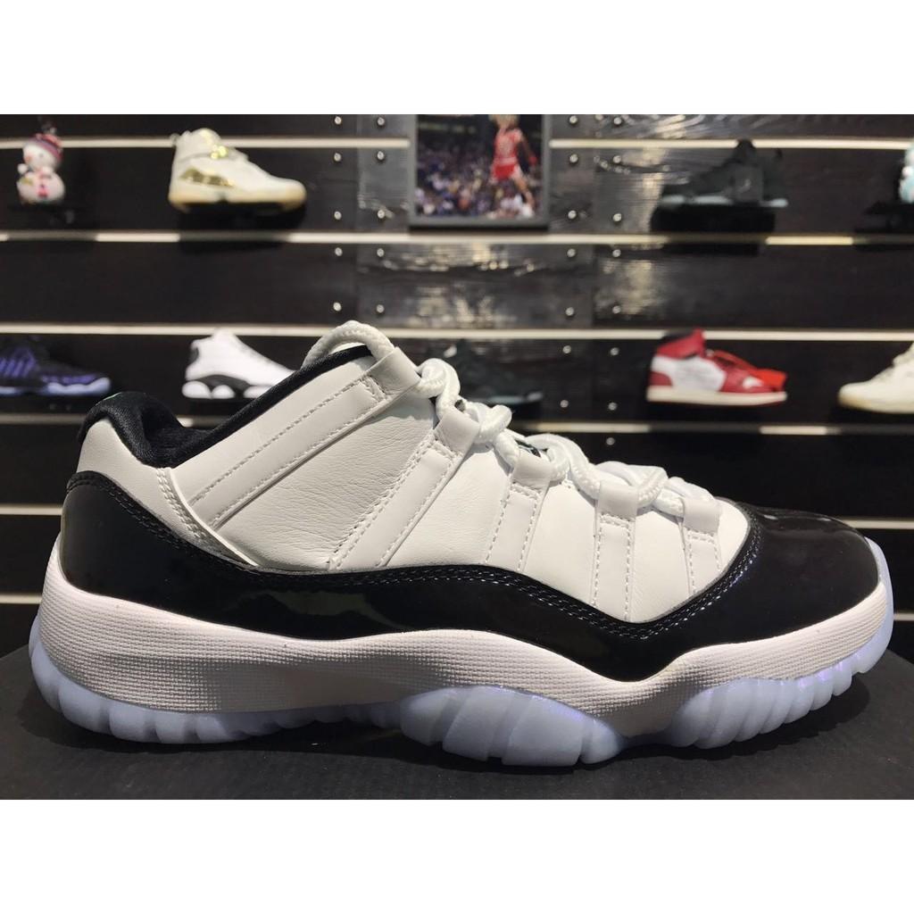 Jordan 11 low clearance black and white