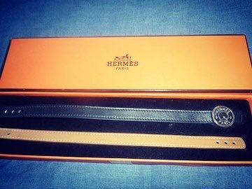 Hermes bracelet (Category: Luxury Accessories) located in Quezon City. Submitted by karma_para_sa_bogus (Listing ID 240736034, Image 1). Description: Hermes looping bracelet. Black and gold (brown/tan) leather straps. Unisex. Large size. Excellent preowned condition. 16,900php.