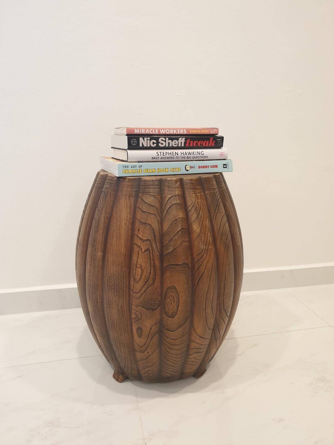 Teak drum stool (Category: Chairs) located in Singapore. Submitted by ms_eclektic (Listing ID 240681421, Image 1). Description: Featuring a beautiful deep brown teak drum stool. Multi functional - can be used functionally as a stool or as a perch for your homeware. Currently used as a side table for my books. Used but in great condition. Easy enough to carry & transported in a taxi. Dimensions 49cm (h) x approx 38cm (at its widest) No low ballers