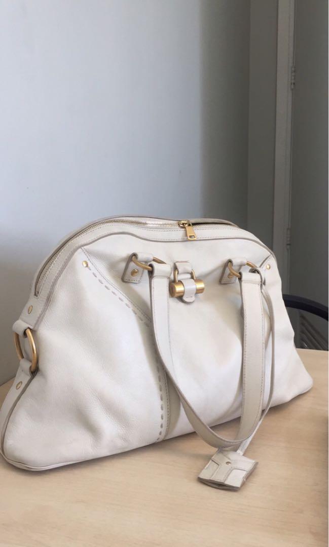 YSL muse (Category: Luxury Bags & Wallets) located in Quezon City. Submitted by jujoo (Listing ID 240617009, Image 1). Description: Price drop!!! (From 19k) In time for morher's day!♥️ YSL muse Color: off-white Size: Medium Inclusions: cards and dustbag Flaws: scuffs on handles, dirt on areas with hardware contact Slightly negotiable!😊.