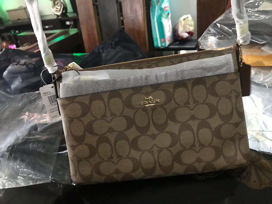 coach sling bag size