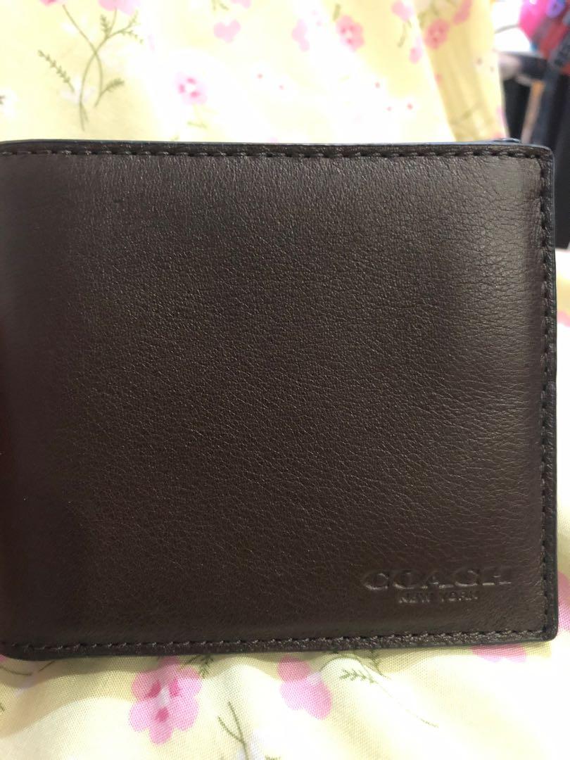 coach wallet cost