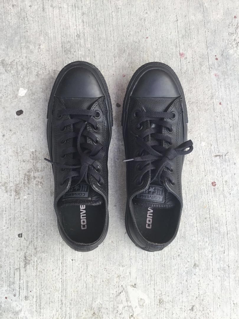 black leather chuck taylors low