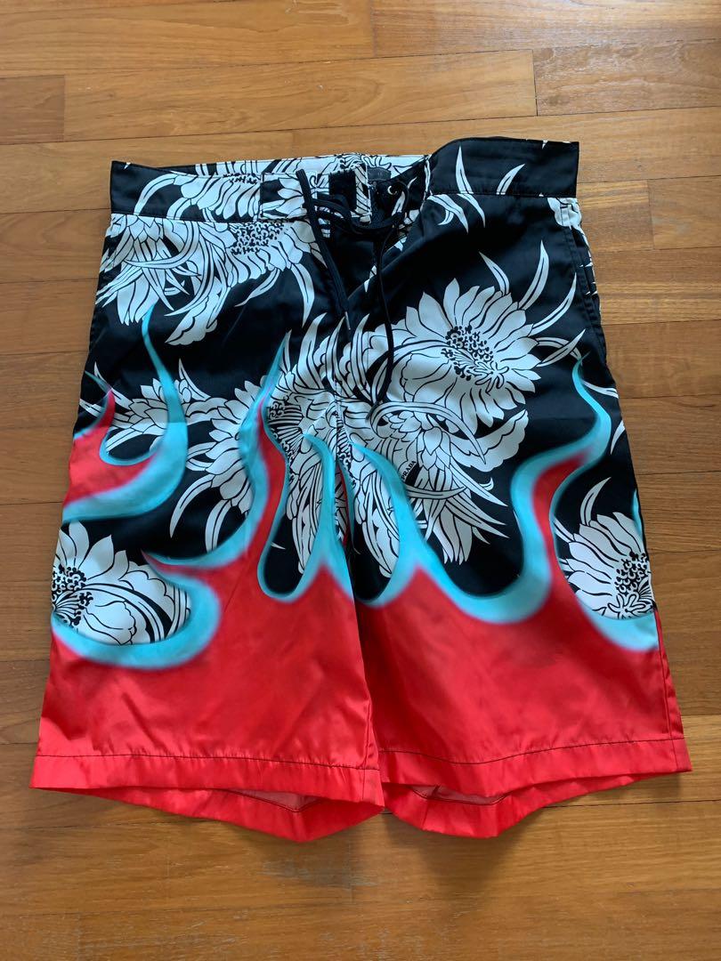 Prada Dahlia flame-print swim shorts, Men's Fashion, Bottoms, Trousers on  Carousell