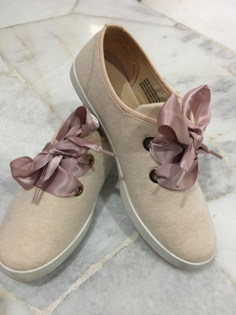 pink shoes with ribbon laces
