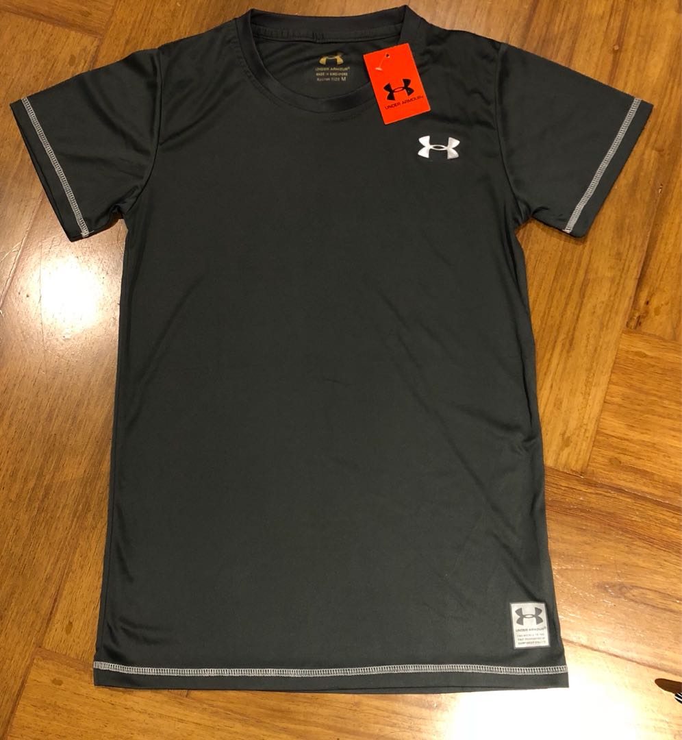 Under Armour shirt (dri fit), Men's Fashion, Activewear on Carousell
