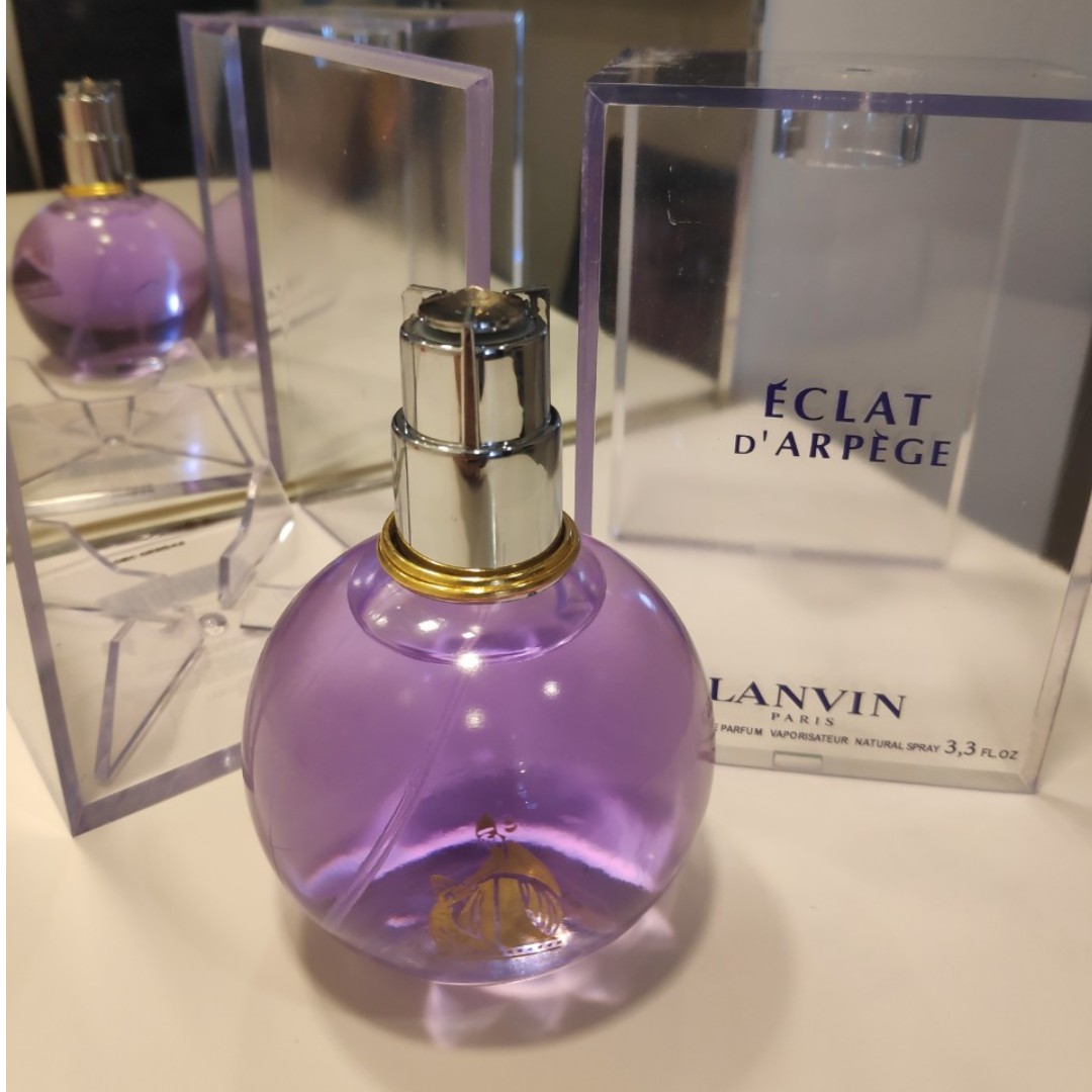 Lanvin eclat оригинал. Lanvin Eclat 100ml. Духи Eclat d'Arpege Lanvin женские 100ml. Ланвин эклат золотое яблоко. Эклат от Ланвин 100мл.