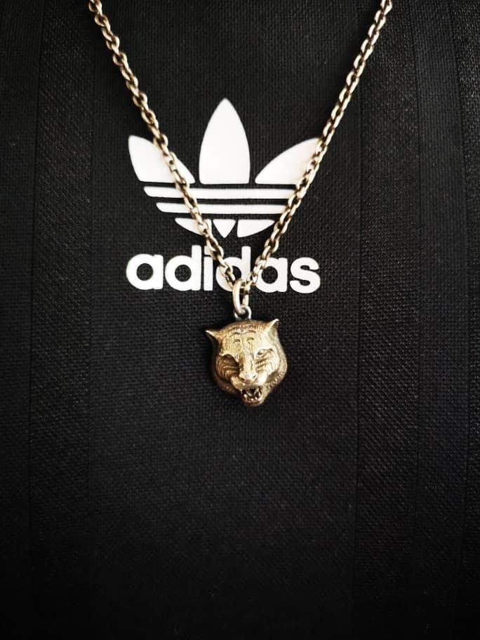 necklace in silver with feline head