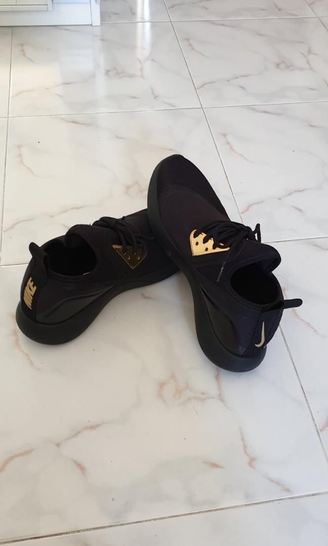 black and gold sneakers nike