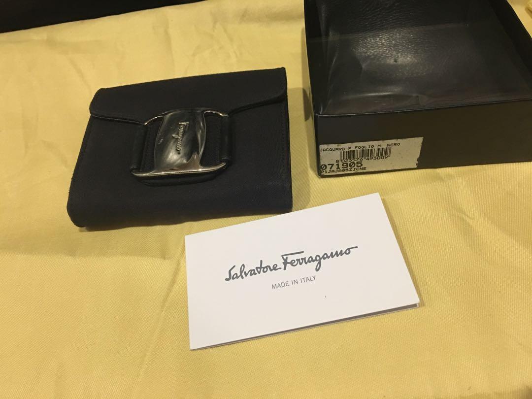 Salvatore Ferragamo Wallet (Category: Luxury Bags & Wallets) located in Pasig City. Submitted by r.dizon (Listing ID 241208338, Image 1). Description: Classic Ferragamo Trifold wallet w/ silver hardware. Front has a coin purse/card holder feature. The wallet opens up in the French style with 3 side card holders, 1 bill/note compartment Gently used, in good condition with scratches on the interior from use. Made in Italy.