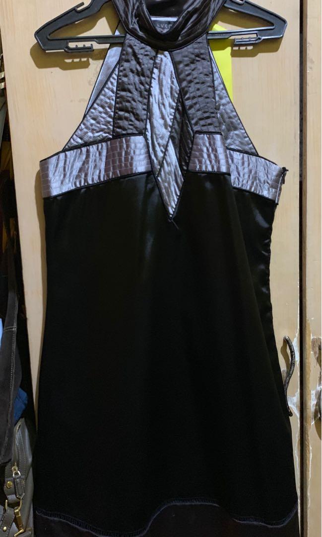 BYSI Haltered Black and grey dress (Category: Dresses) located in Pasig City. Submitted by repentanthoarder (Listing ID 241420471, Image 1). Description: BYSI Black Haltered dress with grey detail XL on tag but fits medium to large frames RFS: decluttering .
